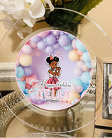 Personalized birthday plate with a cartoon character and 'Happy Birthday Kelly' text, surrounded by balloons.